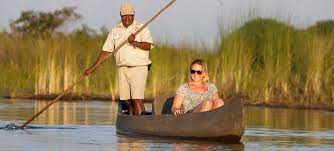 Canoeing across Mokoro River